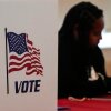 A Fulton County staff member works as people vote in a runoff election, TJune 16, 2026 in Atlanta.