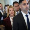 Former U.S. Attorney General Pam Bondi (center) arrives to testify at a closed-door interview with the House Oversight Committee on Capitol Hill on Friday in Washington, D.C. Lawmakers will ask Bondi questions about the federal government's handling of the Jeffrey Epstein case and release of related files to the public.