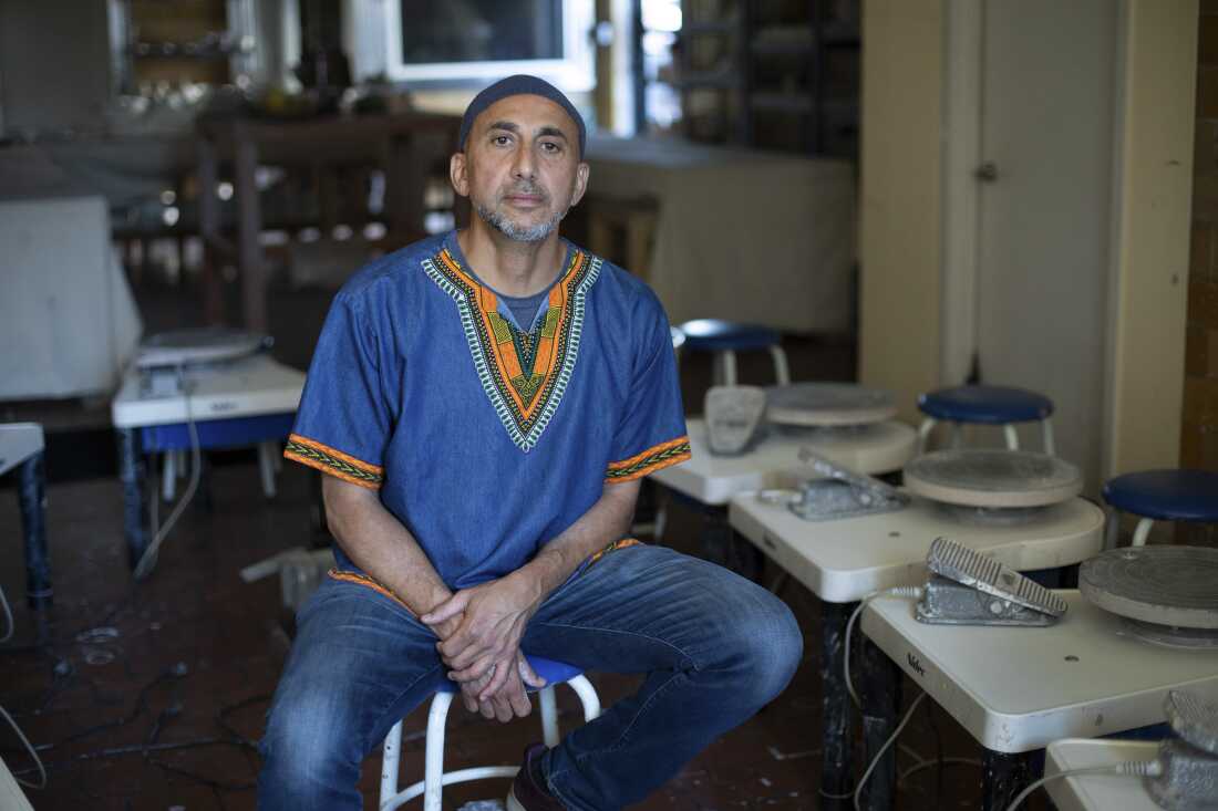 Rami Nashashibi, founder and executive director of the Inner-City Muslim Action Network (IMAN), poses for a portrait in the IMAN ceramics studio on July 8 in Chicago. (Kayana Szymczak )