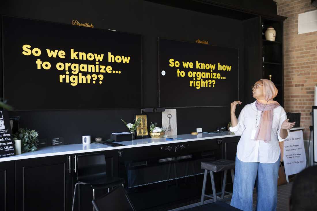 Jannah Sellars, creative and cultural organizing manager at Inner-City Muslim Action Network (IMAN), leads the weekly Organizing Committee meeting at IMAN headquarters on July 8, 2026 in Chicago.