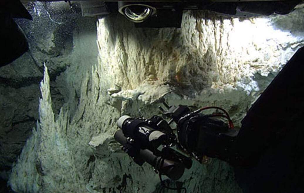 Hydrocarbons are routinely generated by the simple interaction of seawater with the rocks under the Lost City hydrothermal vent field (Woods Hole Oceanographic Institution photo) .