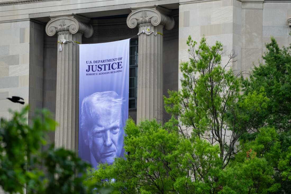 President Trump's image has been added to passports, national park passes and federal buildings — like the Department of Justice headquarters — in his second term.