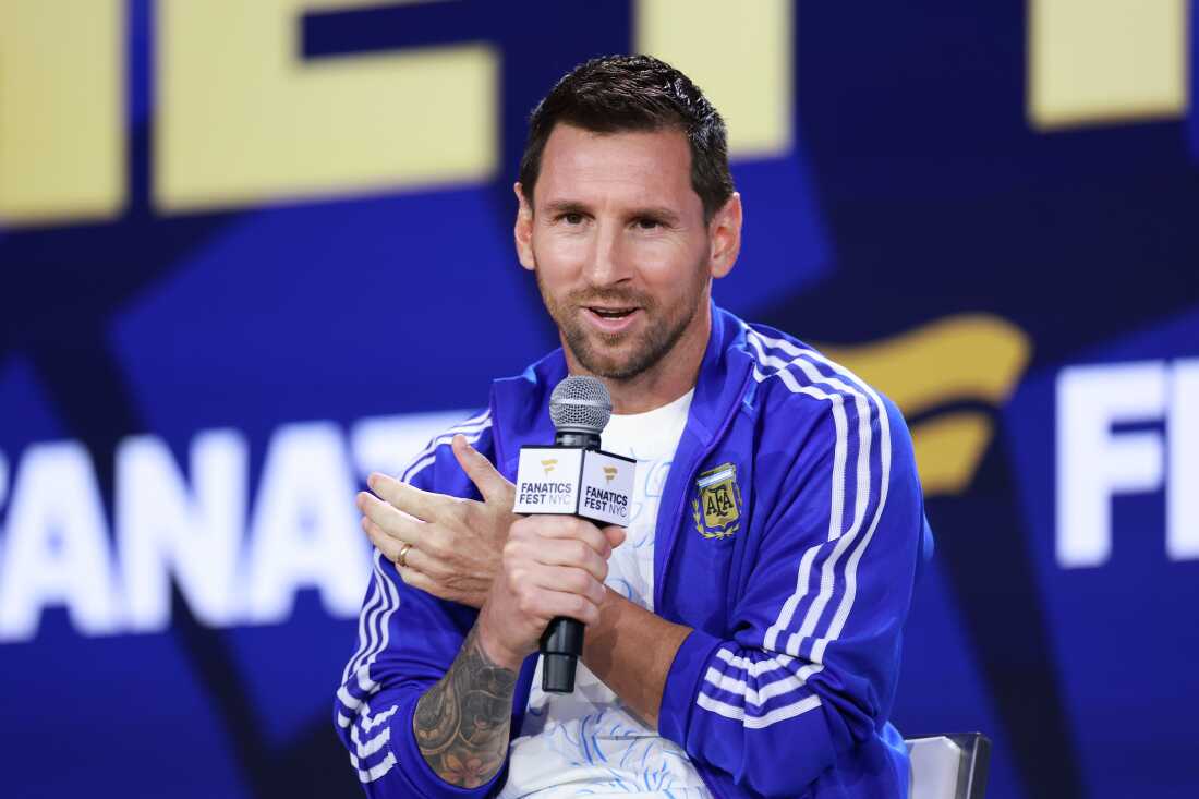 Lionel Messi of Argentina speaks on stage at a fan event in New York City on Friday before Sunday's FIFA World Cup Final between Spain and Argentina.