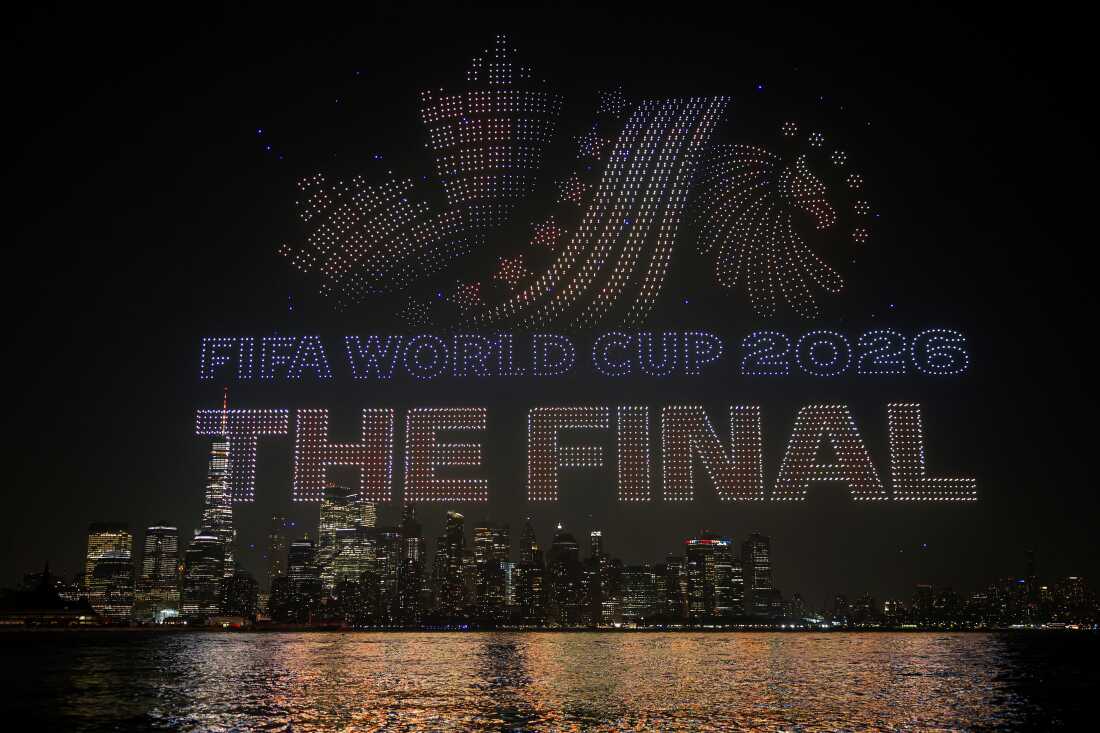 A drone show takes place displaying the message "FIFA World Cup 2026 The Final" with the graphic representing the host countries of Canada, the United States and Mexico, in front of the Lower Manhattan skyline on Friday in Jersey City, N.J.