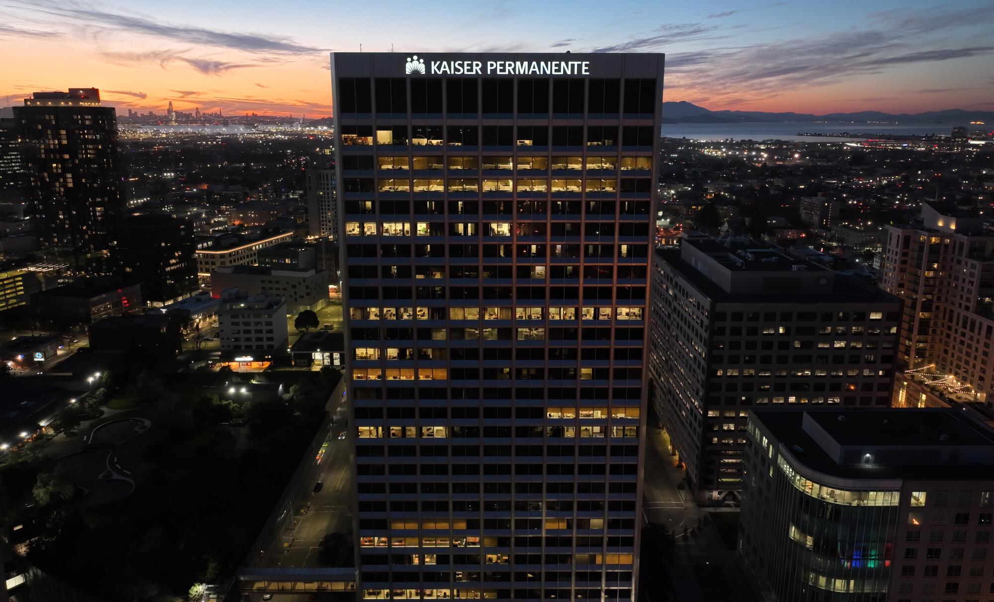 A Kaiser Permanente building at sunset in downtown Oakland