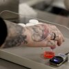 A woman reached for a dose of methadone at the Behavioral Health Network opioid treatment clinic.