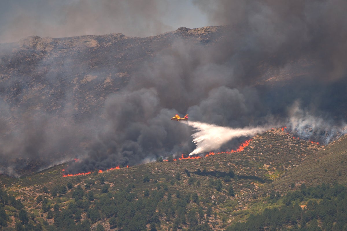 More than 200,000 evacuated in France and Spain as wildfires tear through southern Europe