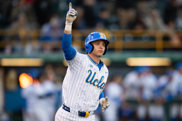 UCLA's Roch Cholowsky reacts after hitting a home run during an NCAA baseball game against Texas Christian, Feb. 20, 2025, in Los Angeles. (AP Photo/Kyusung Gong, File)