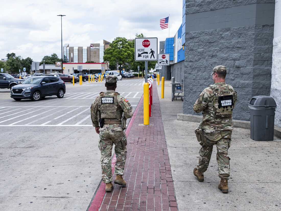 Members of the Tennessee National Guard are seen patrolling at a Walmart in the Memphis area.