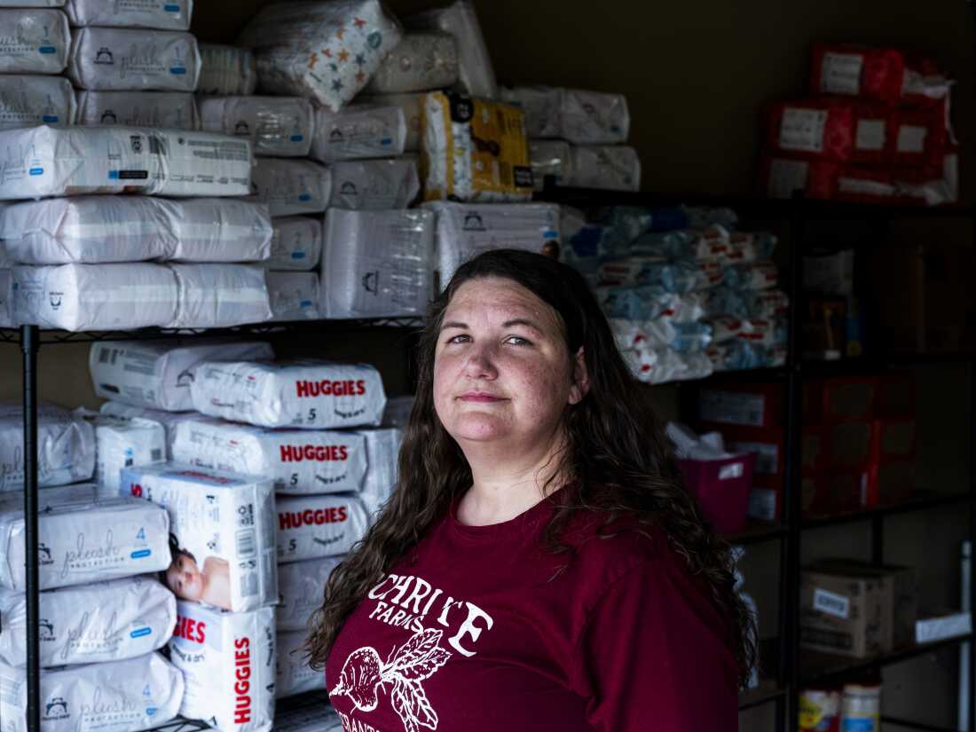 Amber Hampton is seen inside of her garage in a suburb of Memphis where she runs one of the many “immigrant pantries” in the Memphis area.