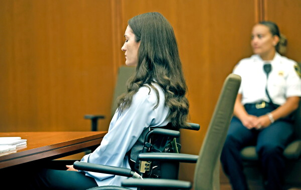 Lindsay Clancy sits as jury selection starts in her murder trial where she is charged in the 2023 killing of her three children, Monday, July 20, 2026, in Plymouth Superior Court in Plymouth, Mass. (Greg Derr/The Patriot Ledger via AP, Pool)