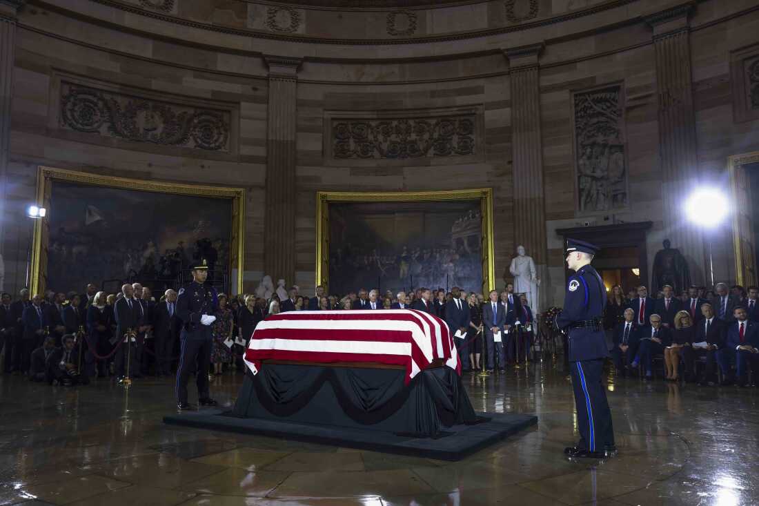 A U.S. Capitol Police honor guard stands watch around the casket during a Congressional tribute to the late Sen. Lindsey Graham, R-S.C., in the Rotunda of the U.S. Capitol on Tuesday.