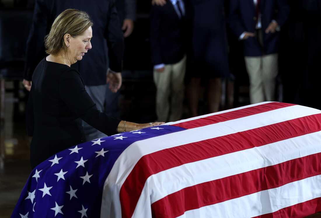 Sen. Darline Graham, R-S.C., pays her respects to her brother in the Rotunda of the U.S. Capitol.