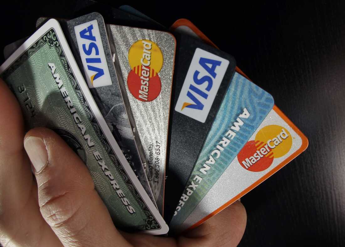 In this March 5, 2012 file photo, consumer credit cards are posed in North Andover, Mass.