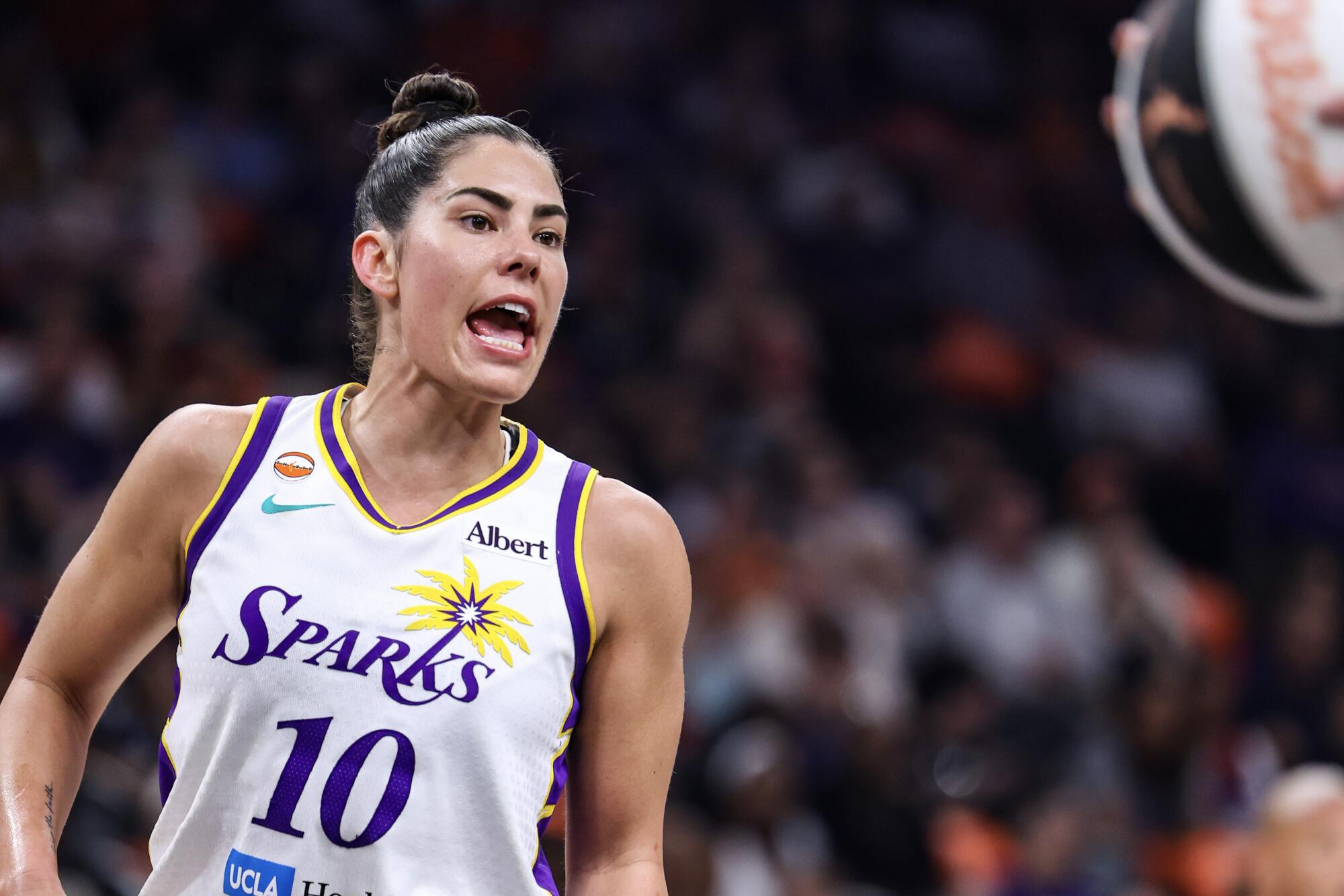 PHOENIX, ARIZONA - JUNE 13: Kelsey Plum #10 of the Los Angeles Sparks yells out.