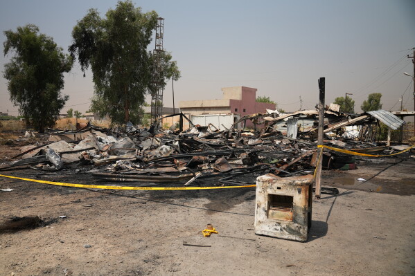 Damaged structures at the site of an airstrike on a Popular Mobilization Forces base in Mosul, Iraq, Wednesday, July 29, 2026. (AP Photo/Farid Abdulwahed)