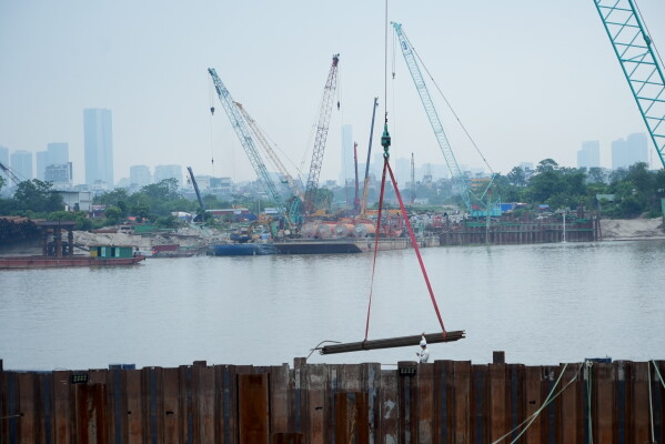 The construction site of a new bridge crossing the Red river is seen in Hanoi, Vietnam, Thursday, June 11, 2026. (AP Photo/Hau Dinh)