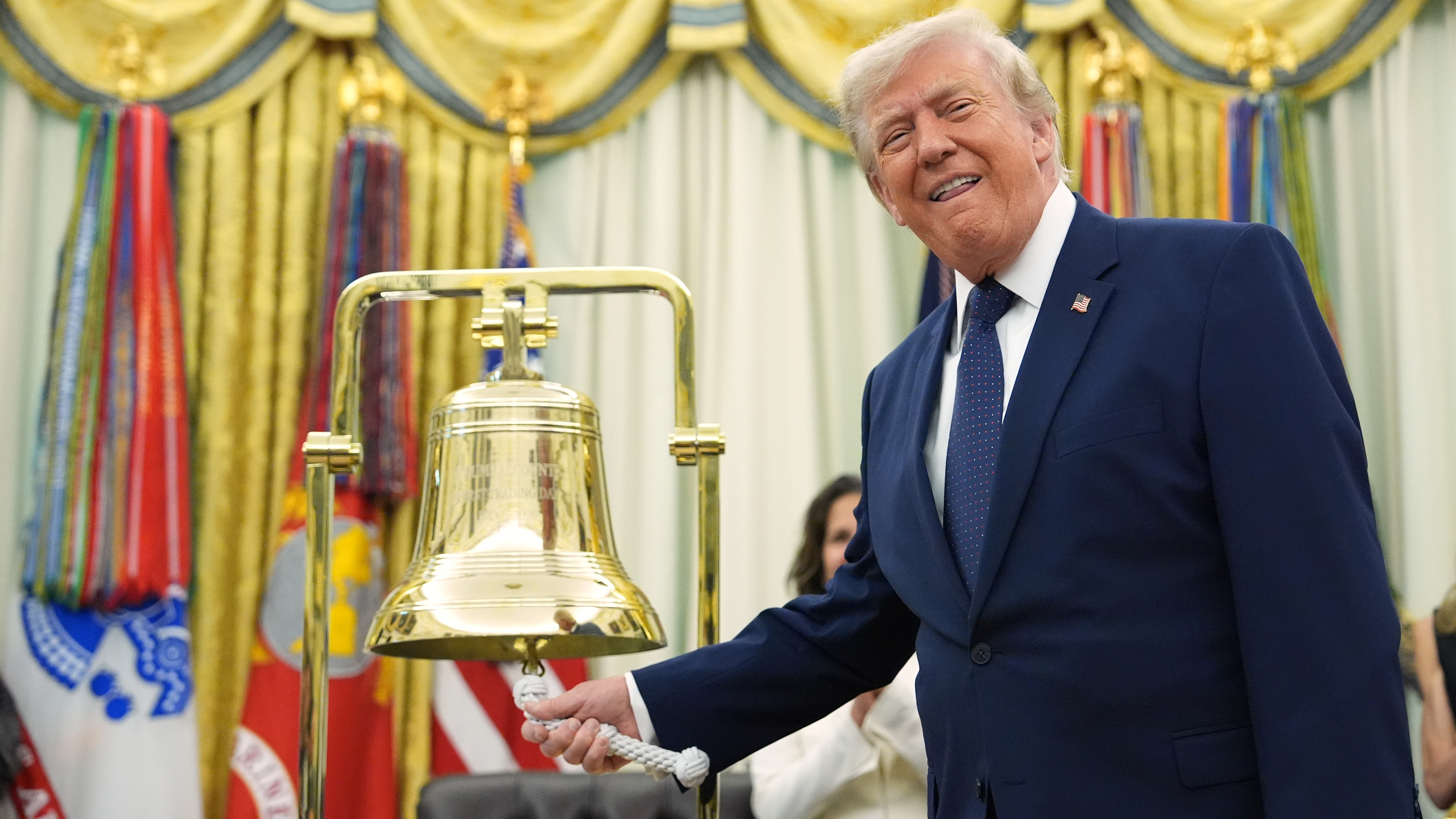 President Donald Trump rings the opening bell for the New York Stock Exchange and the Nasdaq in the Oval Office at the White House, Monday, July 6, 2026, in Washington.