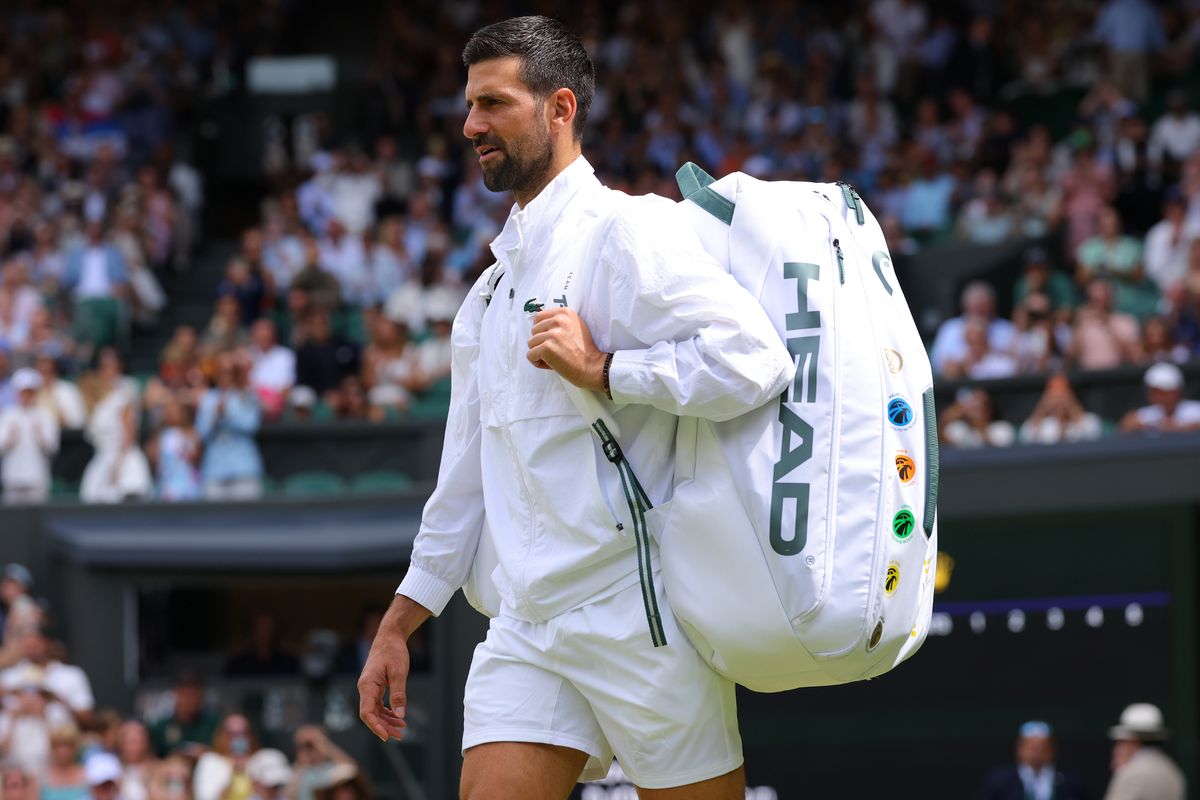 Novak Djokovic looks on