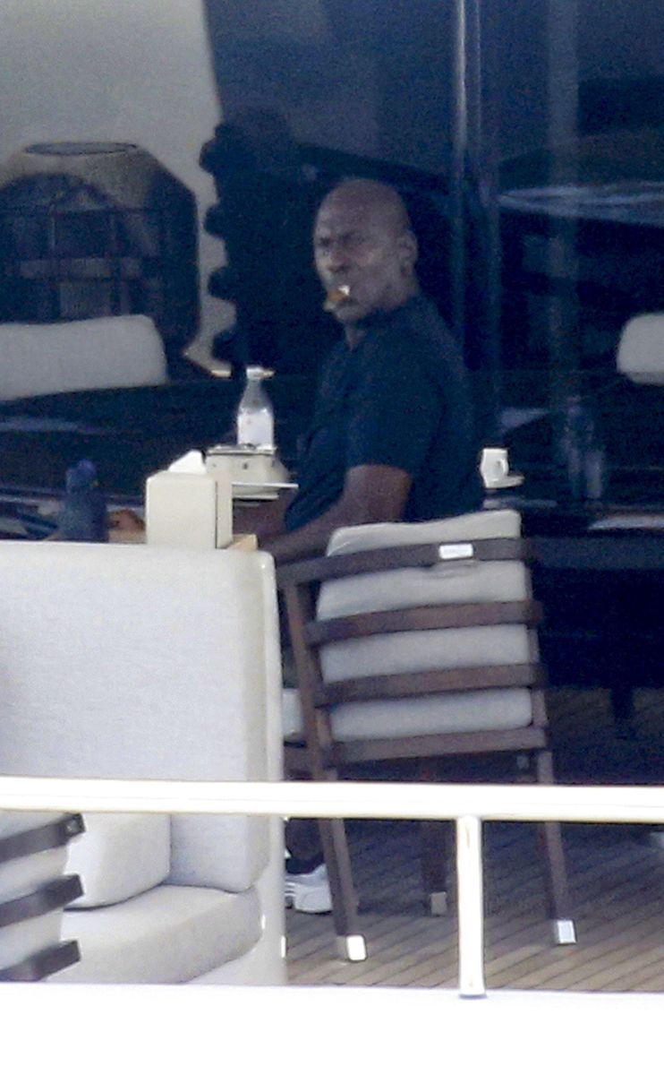 The NBA legend enjoyed a quiet afternoon on deck as the family spent time off the coast of the Italian island.