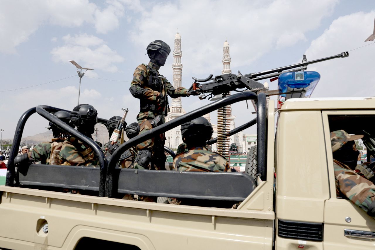 Houthi police officers patrol at a rally held in solidarity with Palestinians and Iran, amid the Iran-Israel conflict, in Sanaa, Yemen, on June 20.