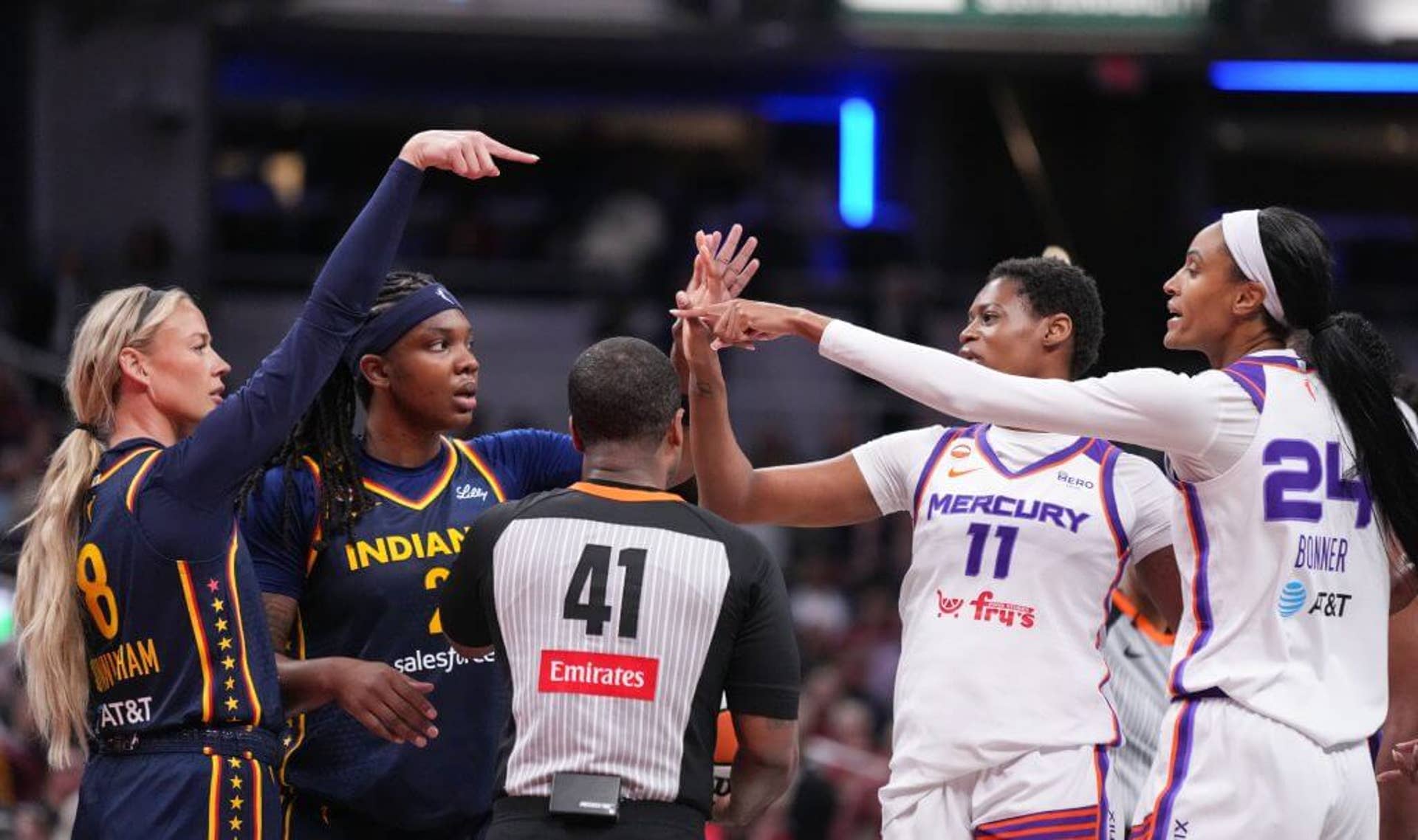 Indiana Fever guard Sophie Cunningham, left, points at Phoenix Mercury forward DeWanna Bonner as an argument broke out between the two players on Monday, June 22, 2026 in Indianapolis.