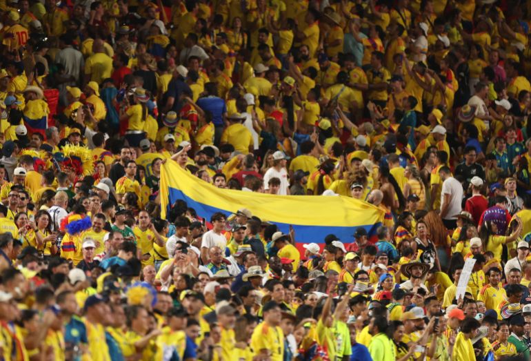 Soccer Football - FIFA World Cup 2026 - Round of 32 - Colombia v Ghana - Kansas City Stadium, Kansas City, Missouri, U.S. - July 3, 2026 Colombia fans celebrate after the match as Colombia qualify for the Round of 16 stage of the World Cup REUTERS/Siphiwe Sibeko