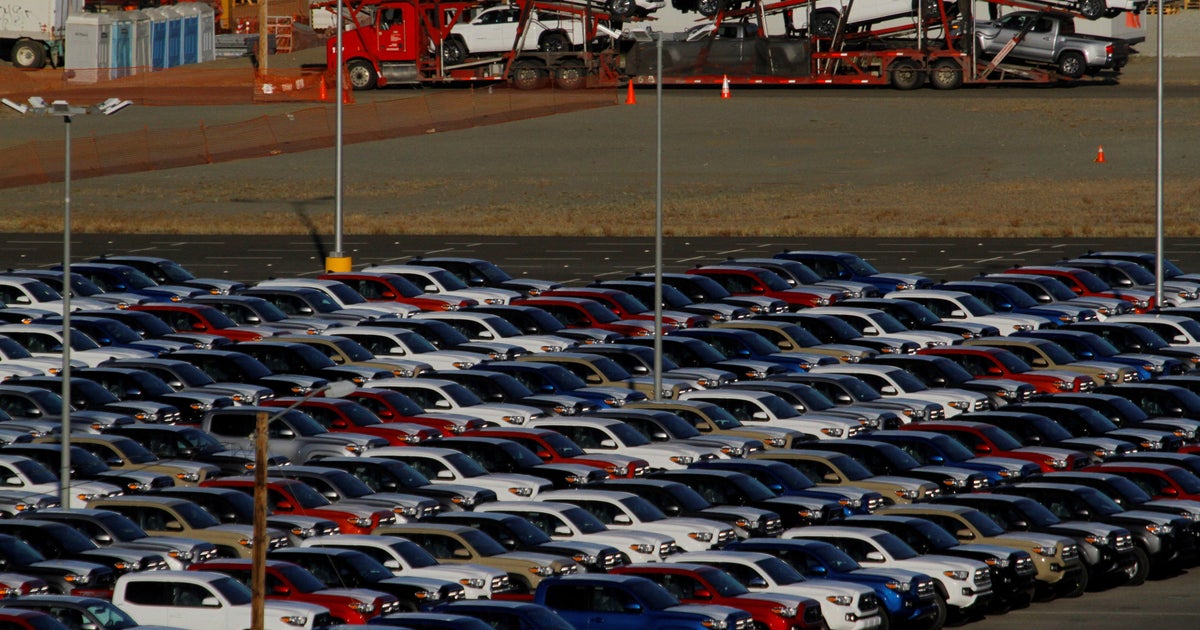 FILE PHOTO: Newly assembled vehicles are seen at a stockyard of the automobile plant Toyota Motor Manufacturing of Baja California in Tijuana, Mexico