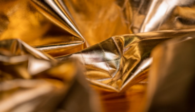 Close-up of crumpled golden metallic texture