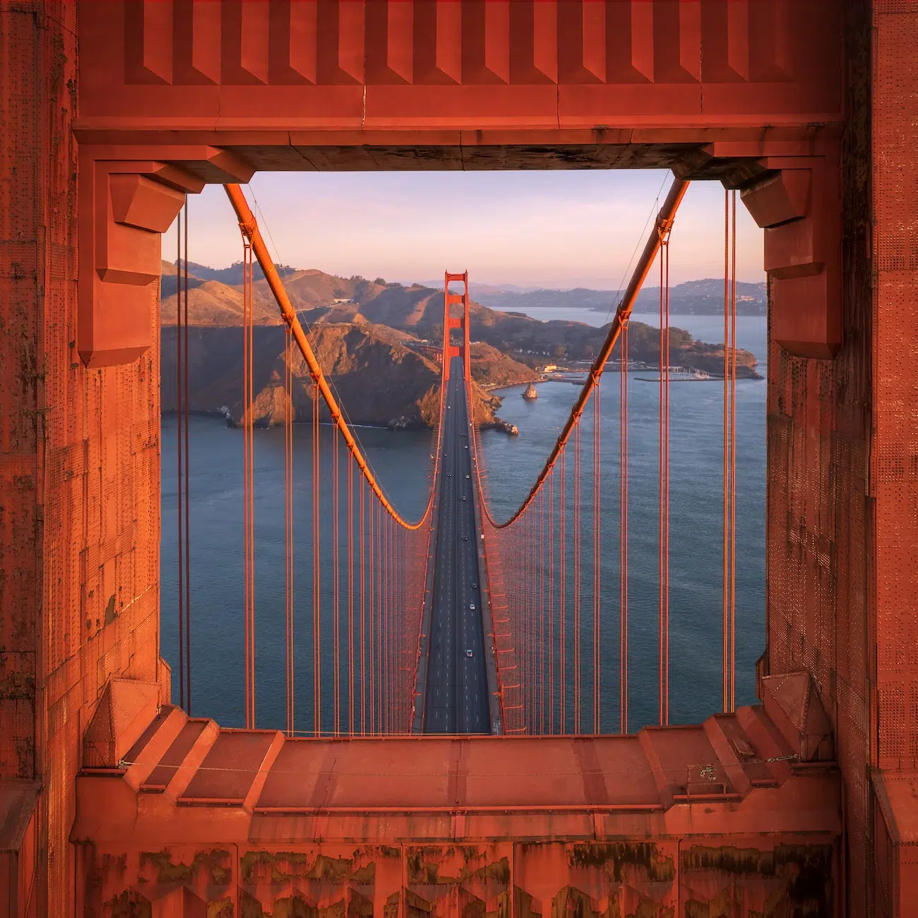 The Golden Gate Bridge framed by its own steel suspension cables