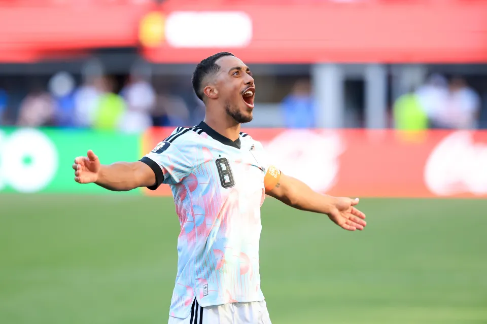 Youri Tielemans celebrates scoring for Belgium against the USA at the World Cup