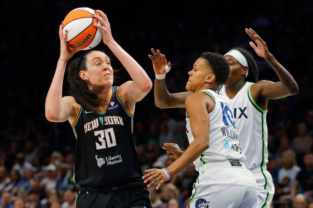 New York Liberty forward Breanna Stewart (30) shoots against Minnesota Lynx guard Courtney Williams (10) in the first quarter at Target Center. 