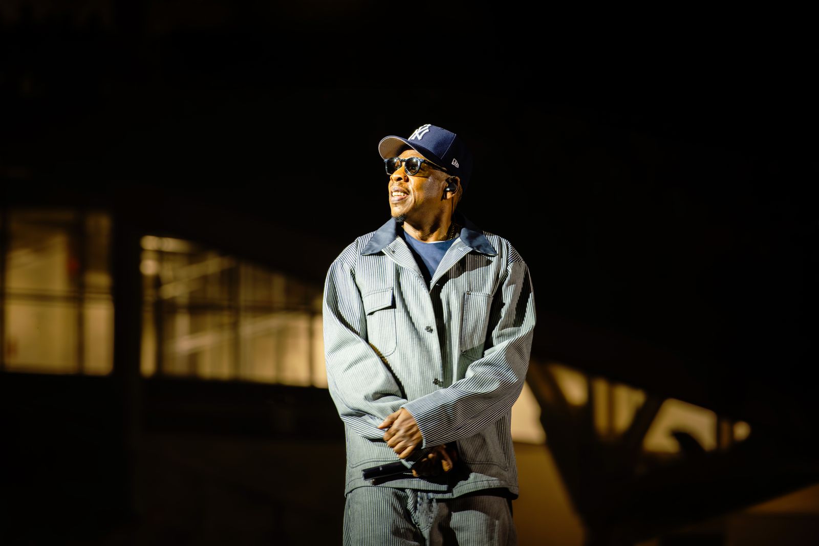 Image may contain JayZ Baseball Cap Cap Clothing Hat People Person Face Head Photography Portrait and Adult