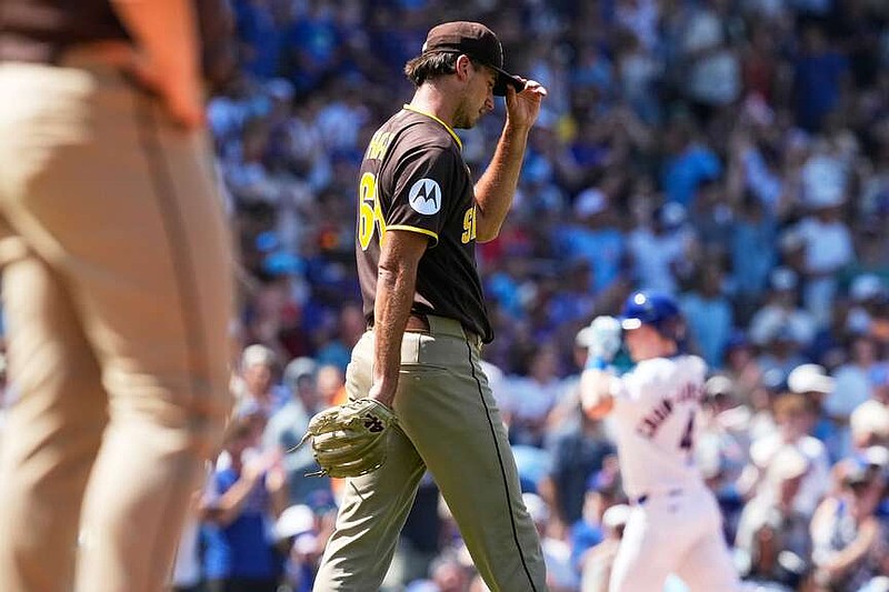 San Diego Padres relief pitcher Kyle Hart reacts after Chicago Cubs' Pete Crow-Armstrong hit a three-run home run during the fifth inning of a baseball game in Chicago, Wednesday, July 1, 2026. (AP Photo/Nam Y. Huh)