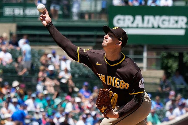 San Diego Padres starting pitcher Walker Buehler throws against the Chicago Cubs during the first inning of a baseball game in Chicago, Wednesday, July 1, 2026. (AP Photo/Nam Y. Huh)