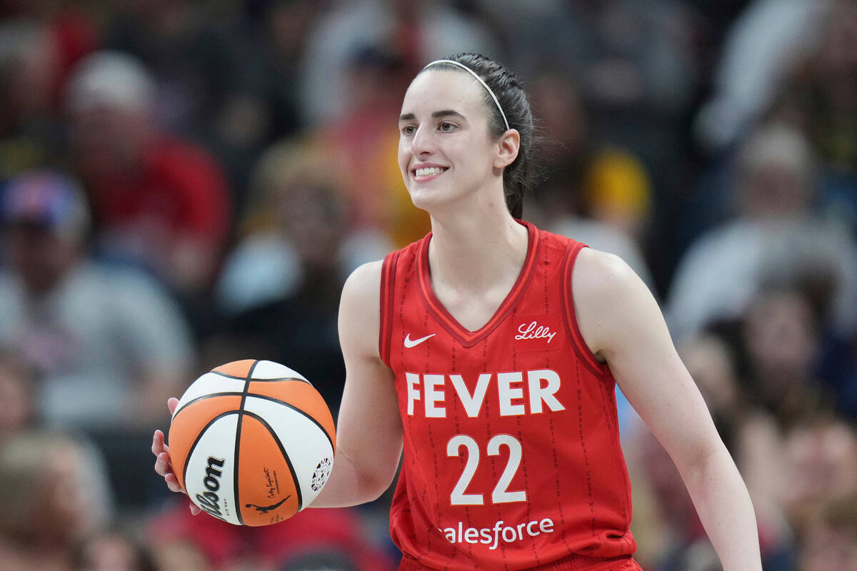 Indiana Fever guard Caitlin Clark (22) in action during a WNBA basketball game against the Chic ...