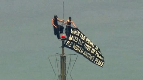 Couple arrested on Empire State Building after apparent proposal – video