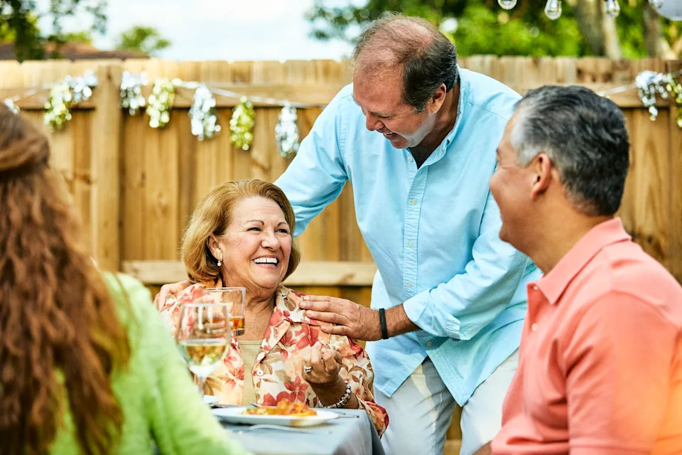 Women at a party in backyard