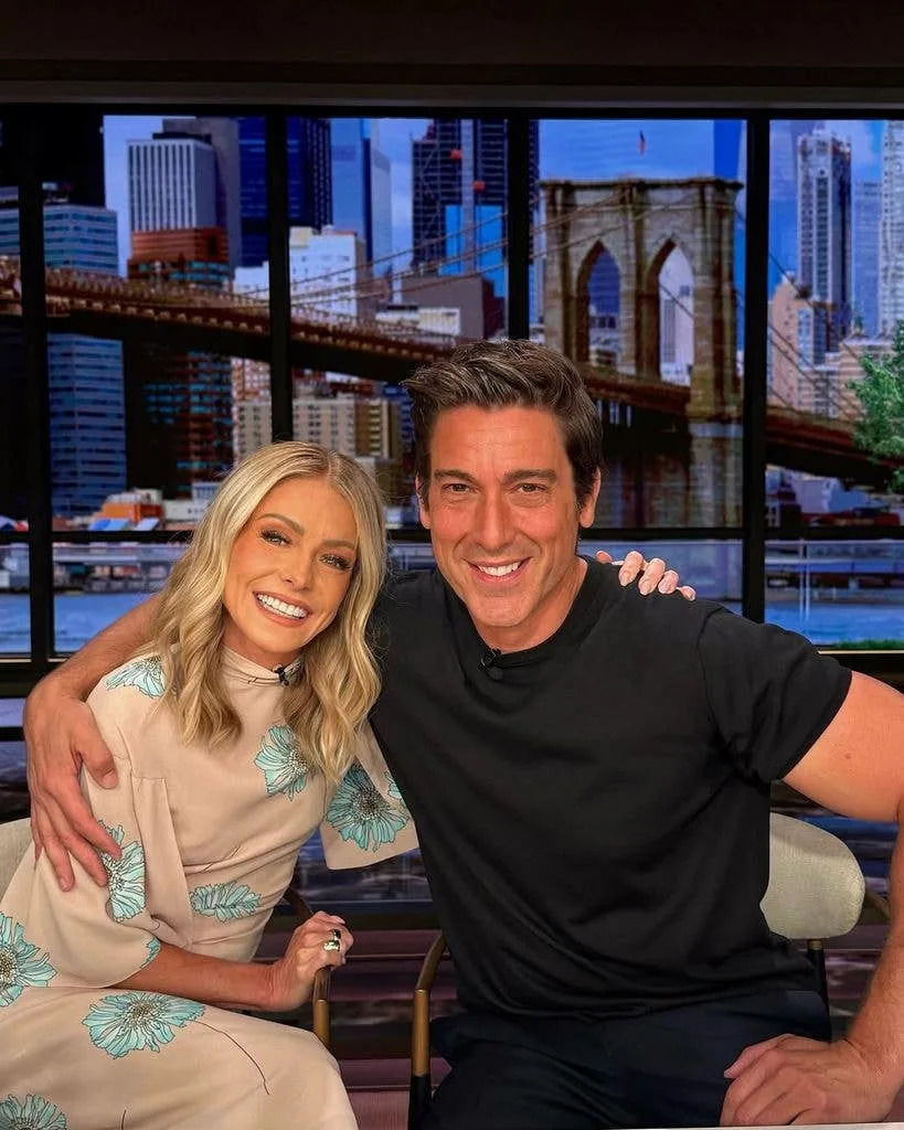 David Muir and Kelly Ripa pose for a photo on the set of LIVE with Kelly and Mark on Wednesday, July 30