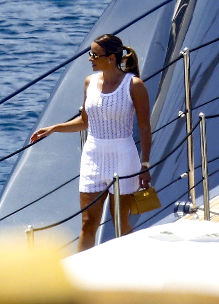 Yvette Prieto stepped off Michael Jordan's luxury yacht in Sardinia wearing an elegant white knit mini dress perfect for Mediterranean summer style.