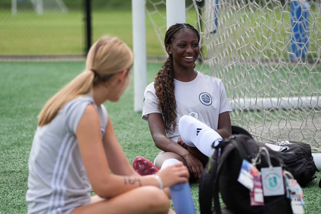 Makenna Johnson talks with other players before tryouts at Riverline Park in Mableton, Georgia, on May 27, 2026.