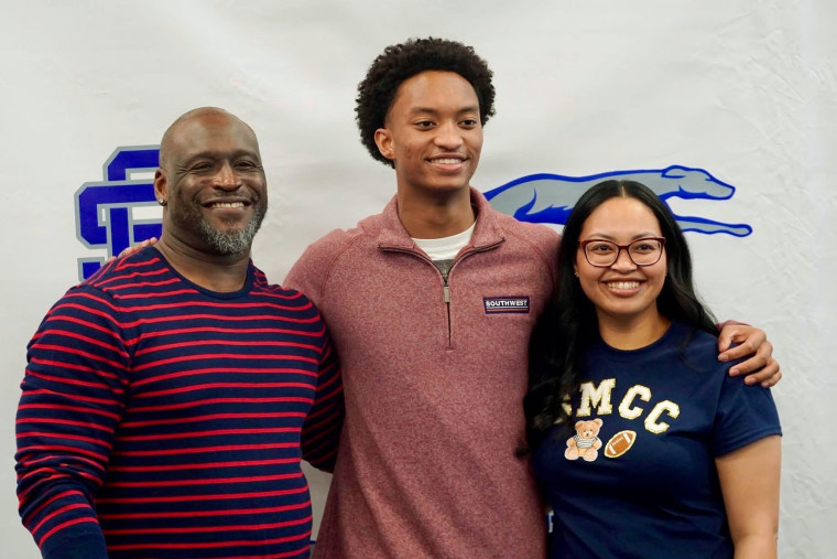 Nolan Wells with his parents.