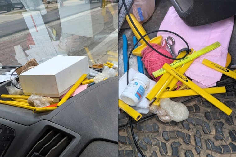 AFFIANT observed three plastic bags containing a white crystal-like substance in the middle of the dash between the driver and passenger side of the vehicle. FBI’s Evidence Response Team subsequently arrived on the scene and from the outside of vehicle, took photos of the vehicle’s interior.