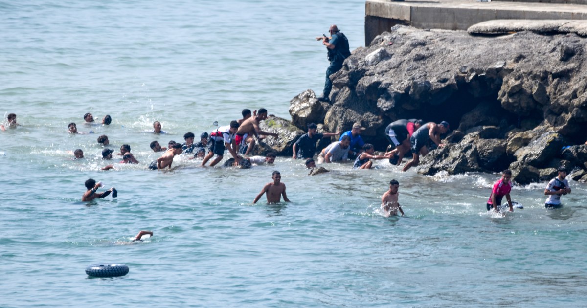 Thousands break through border of Morocco into Spain’s African Ceuta enclave