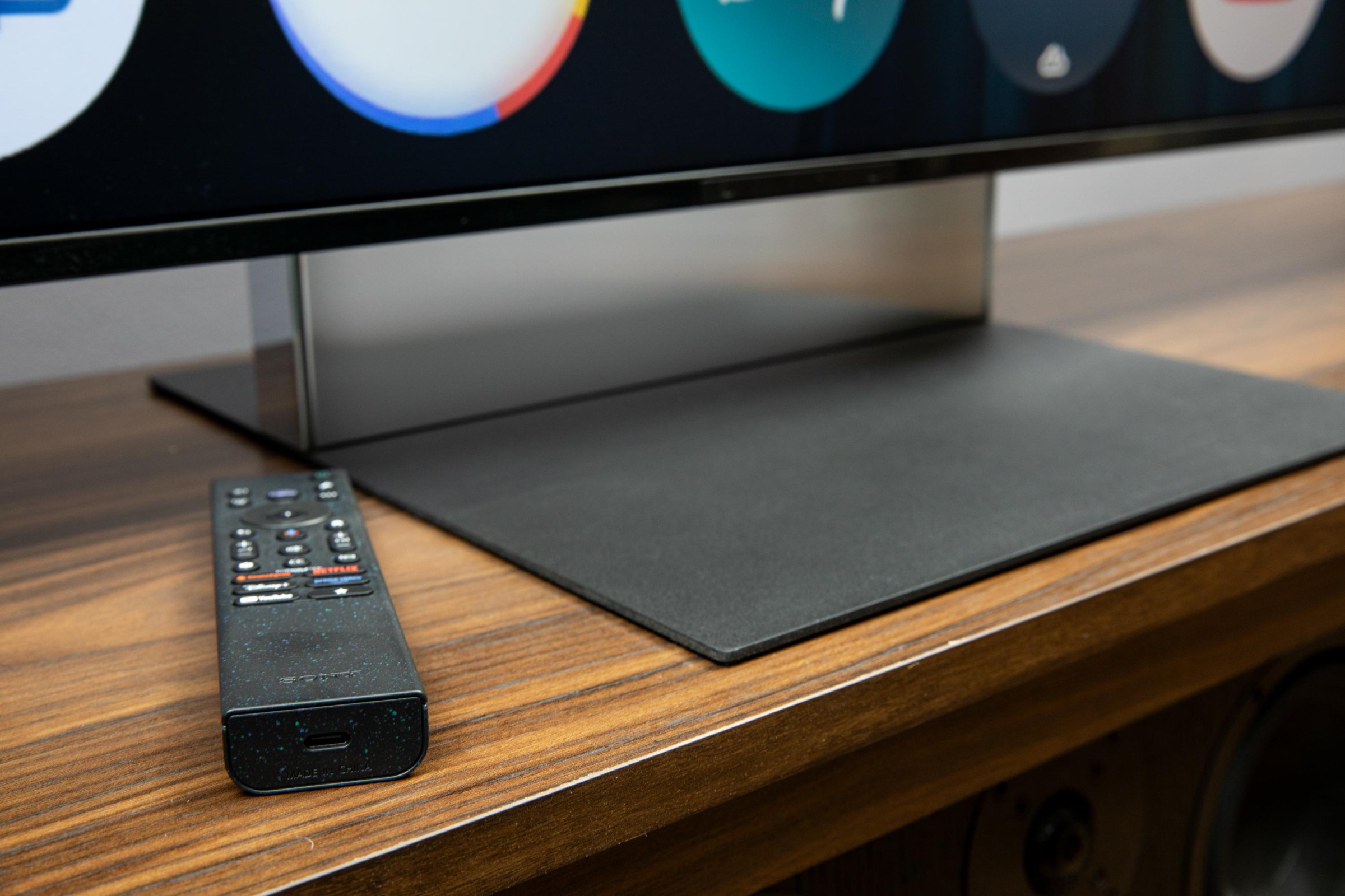 A closeup of the remote and lenticular stand on the Sony Bravia 9 II RGB LED TV.