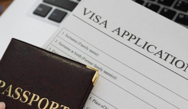 Lawsuit: Iowa worker stranded in Canada for a year due to visa-related delays