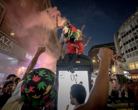 Supporters of Morocco gather on Edgware Road in London during the France v Morocco World Cup quarter-final