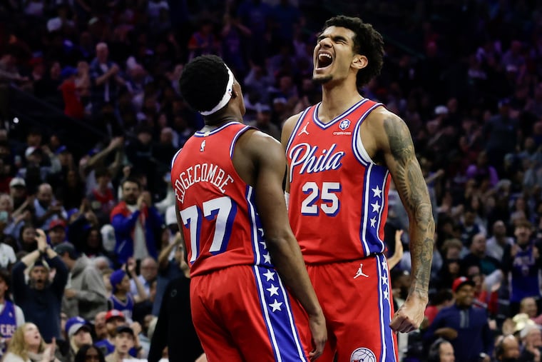 Dominick Barlow (right) averaged 7.7 points, 4.8 rebounds, and 1.2 assists and thriving as a cutter and high-energy player in 71 games with 59 starts.