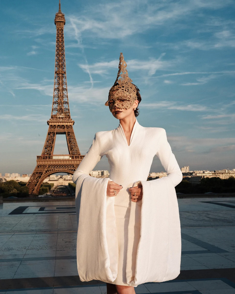 Zendaya poses with the Eiffel Tower in the background.