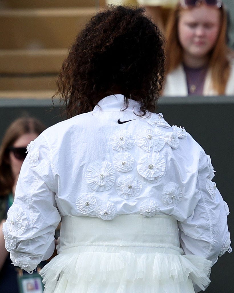 details of the outfit of japans naomi osaka as she warms up before her womens singles second round tennis match on the third day of the 2026 wimbledon championships at the all england lawn tennis and croquet club in wimbledon, southwest london, on july 1, 2026 photo by adrian dennis  afp via getty images  restricted to editorial use